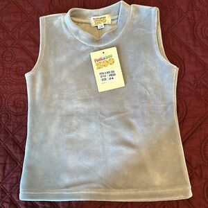 Very cute soft top for little princess, size 3-4Y. Smoke and pets free home.